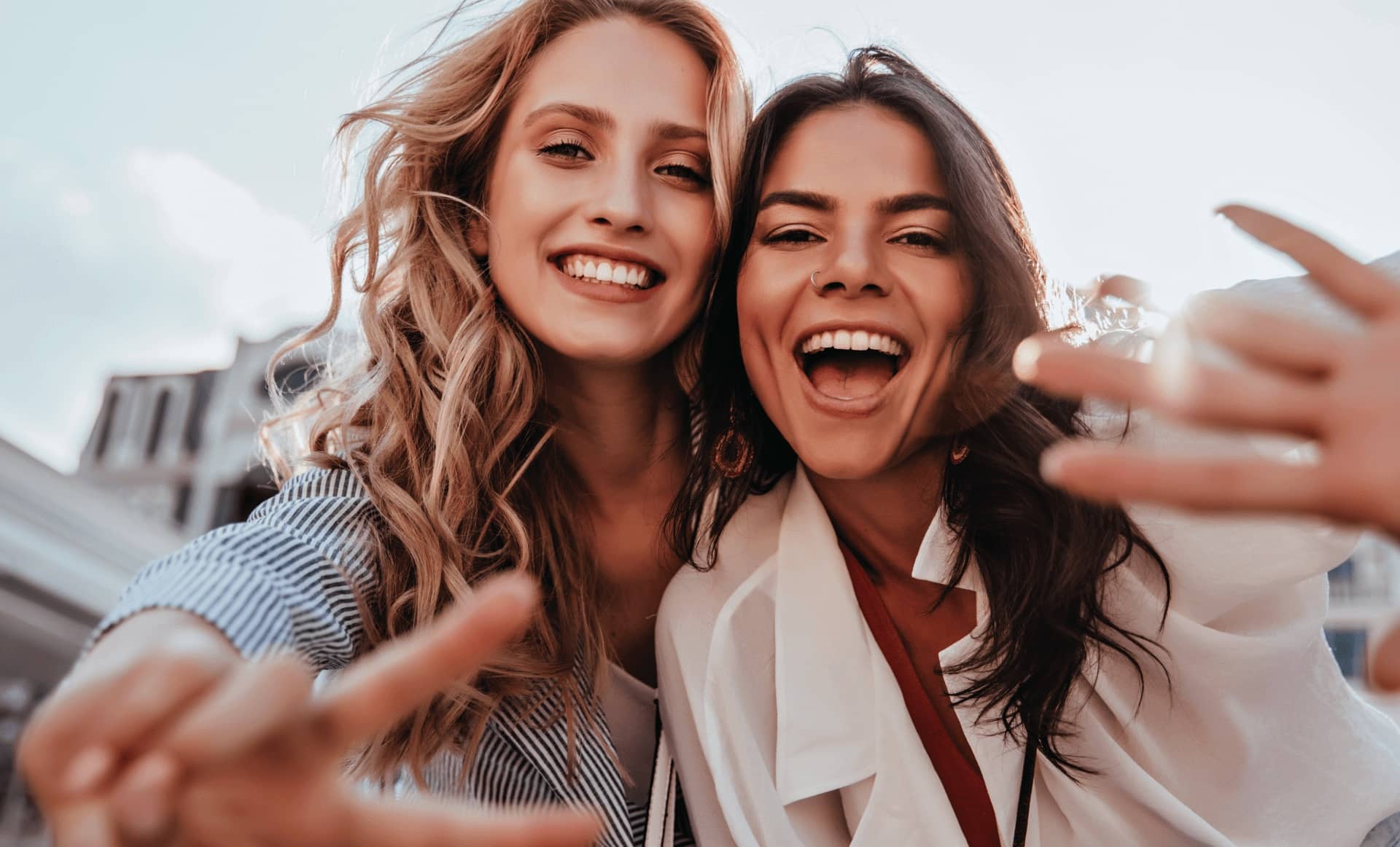 Two joyful friends discover the world through live video chat Mixu